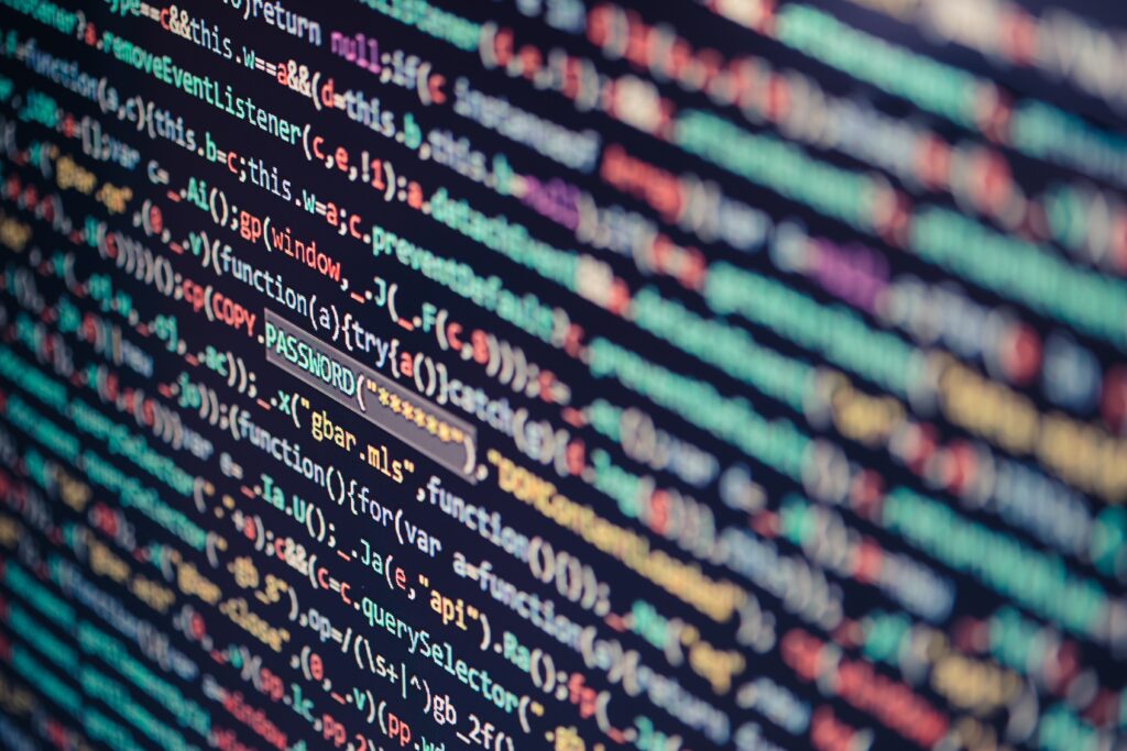 Computer screen displaying program code, website development, application building, password